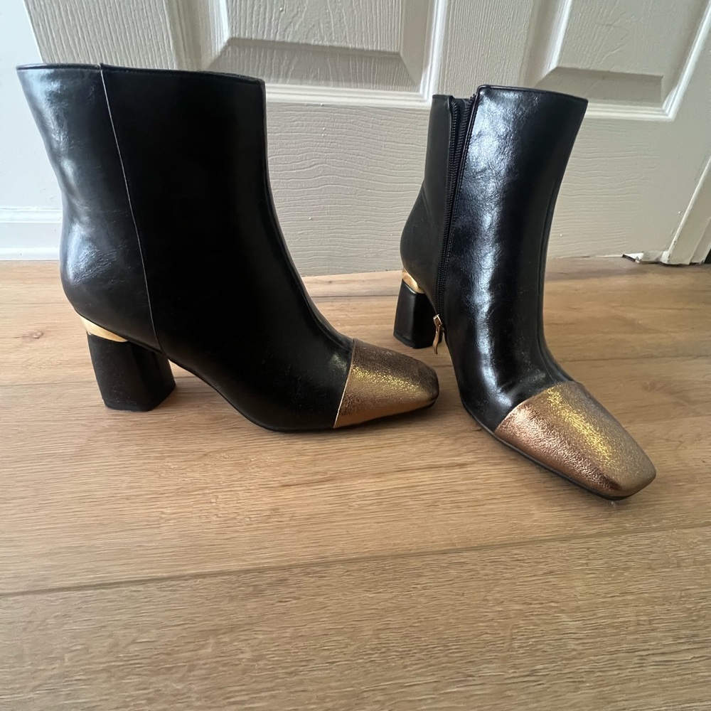 Stylish Black Ankle Boots with Gold Toe